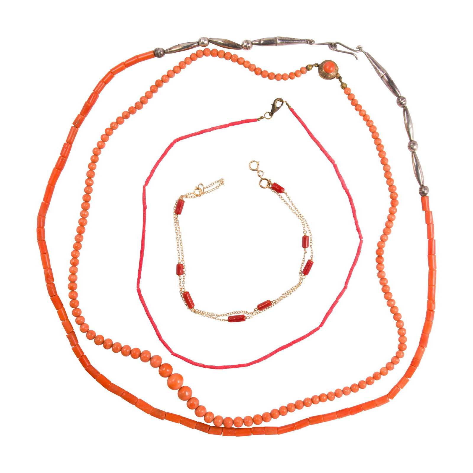 A group of three coral bead necklaces: A group of three coral bead necklacescomposed of cylindrical and round beads of varying sizes, completed by silver and metal clasps; lengths: 28, 25 and 17 in; gross weight approximately 62.77 grams