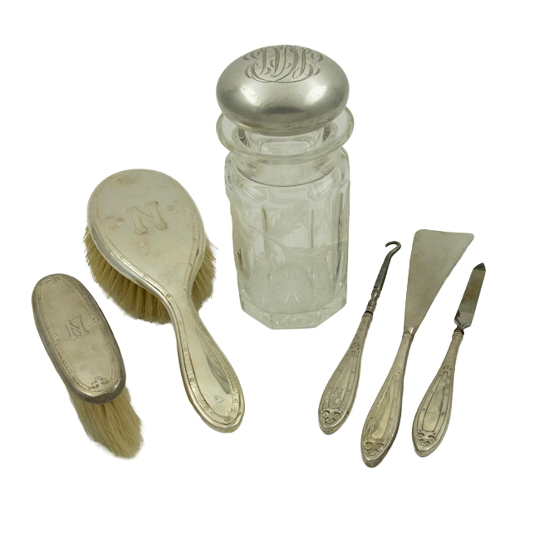 A five piece sterling mounted dresser set and a dresser bottle (1 of 2)