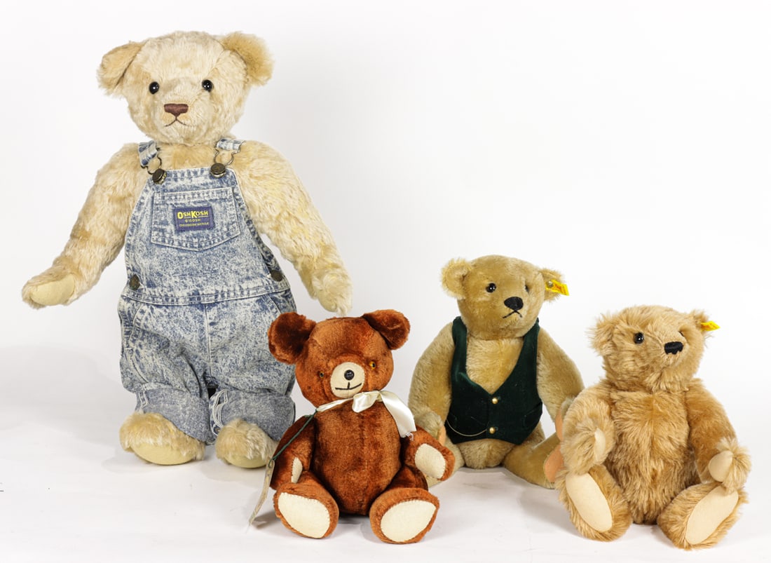 A group of four German and American plush teddy bears: A group of four German and American plush teddy bears, 20th century, including two Steiff examples, one with yellow ear tag 0155/37 and another 0151/32; one artist bear with tag marked 'Linda