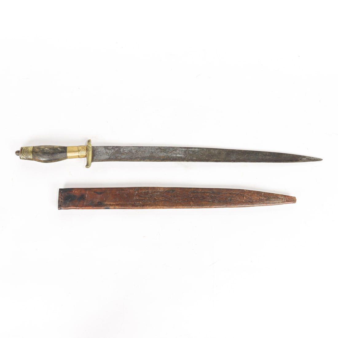 A dagger with brass mounted handle and leather sheath: A dagger with brass mounted handle and leather sheath, dated 1955, overall 24.5"