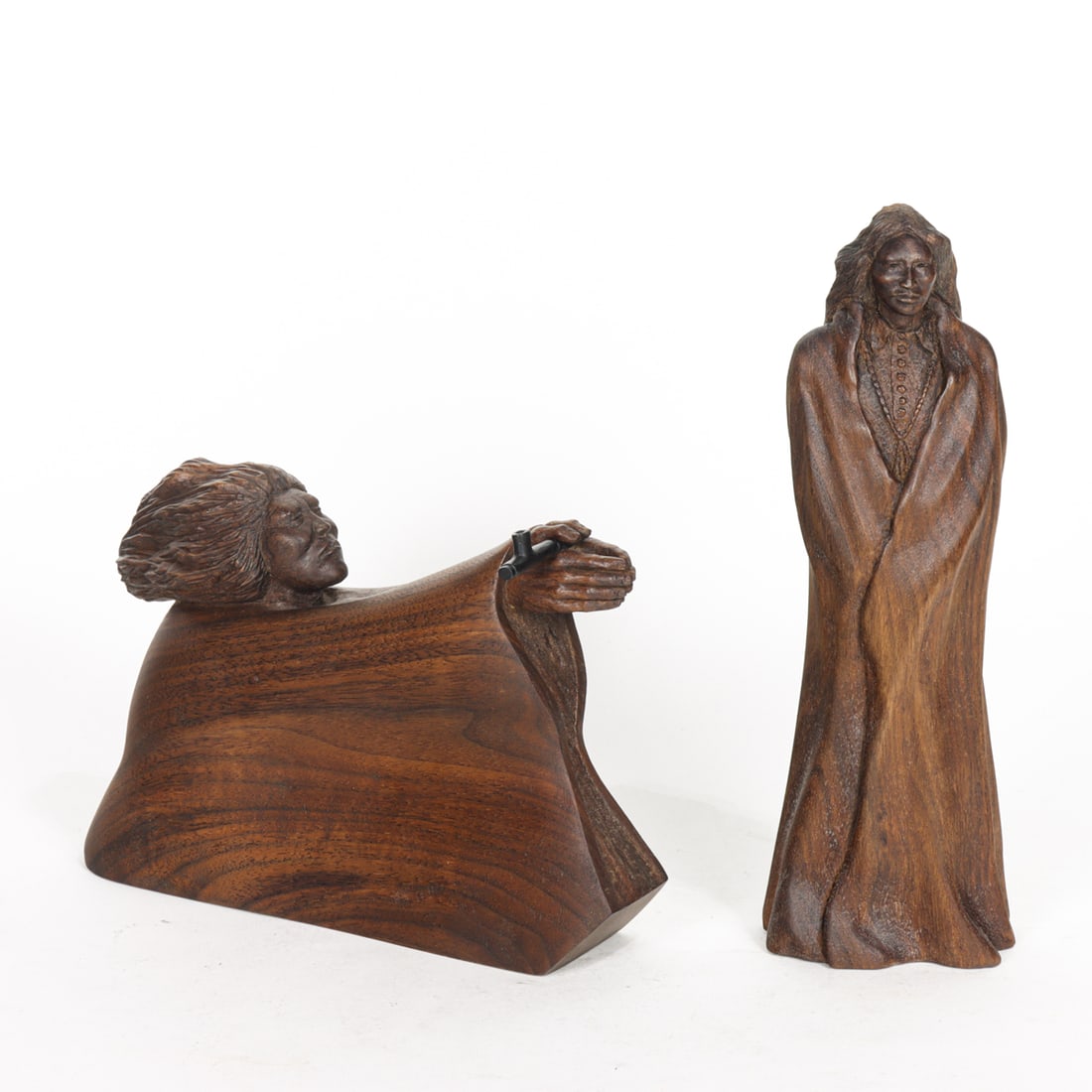 Two T. Williams carved wood figures of Native Americans: Two T. Williams carved wood figures of Native Americans, each with engraved signature, the first titled 'Burnt Offering, 6"h; the second titled 'Navajo Girl', 10"h