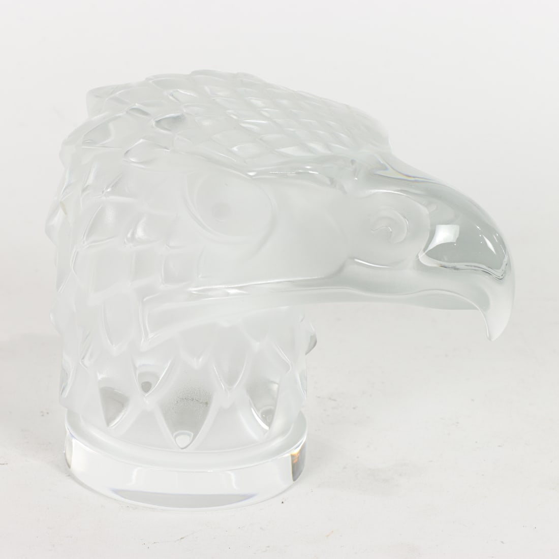 A Lalique glass Tete d'Aigle (eagle head) mascot: A Lalique glass Tete d'Aigle (eagle head) mascot, engraved factory mark, 4.5"h