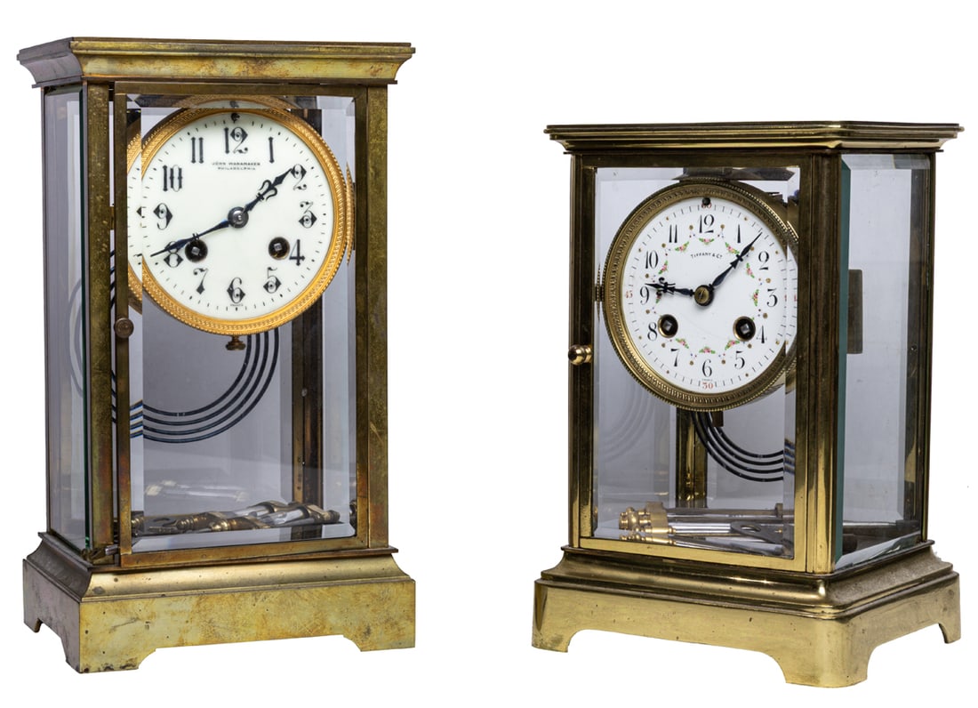 Two French brass and four-glass mantel clocks: Two French brass and four-glass mantel clocks, retailed by Tiffany & Co., New York and Wannamaker, Philadelphia, greatest 10.5"h x 6.25"w x 4.5"d
