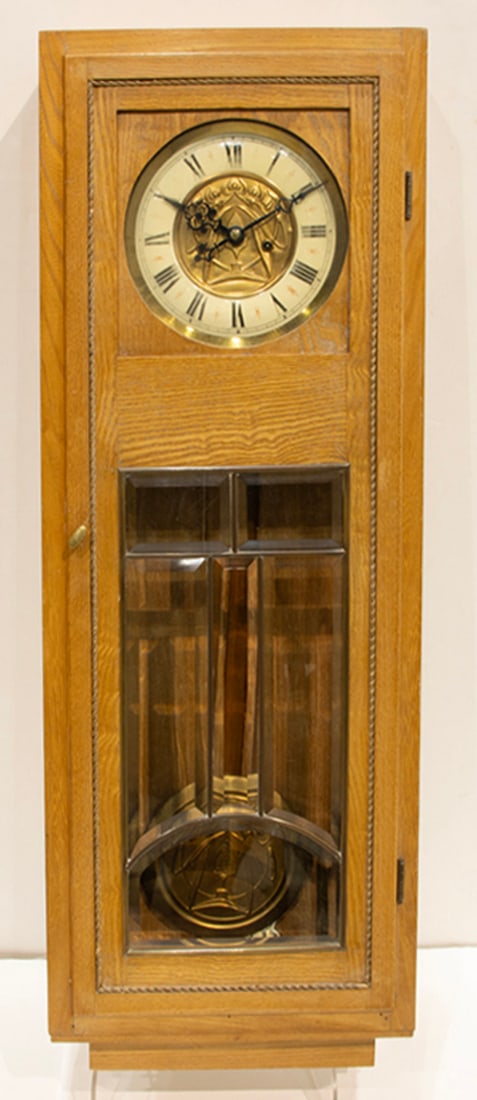 An Arts and Crafts style oak and leaded glass wall clock (1 of 2)