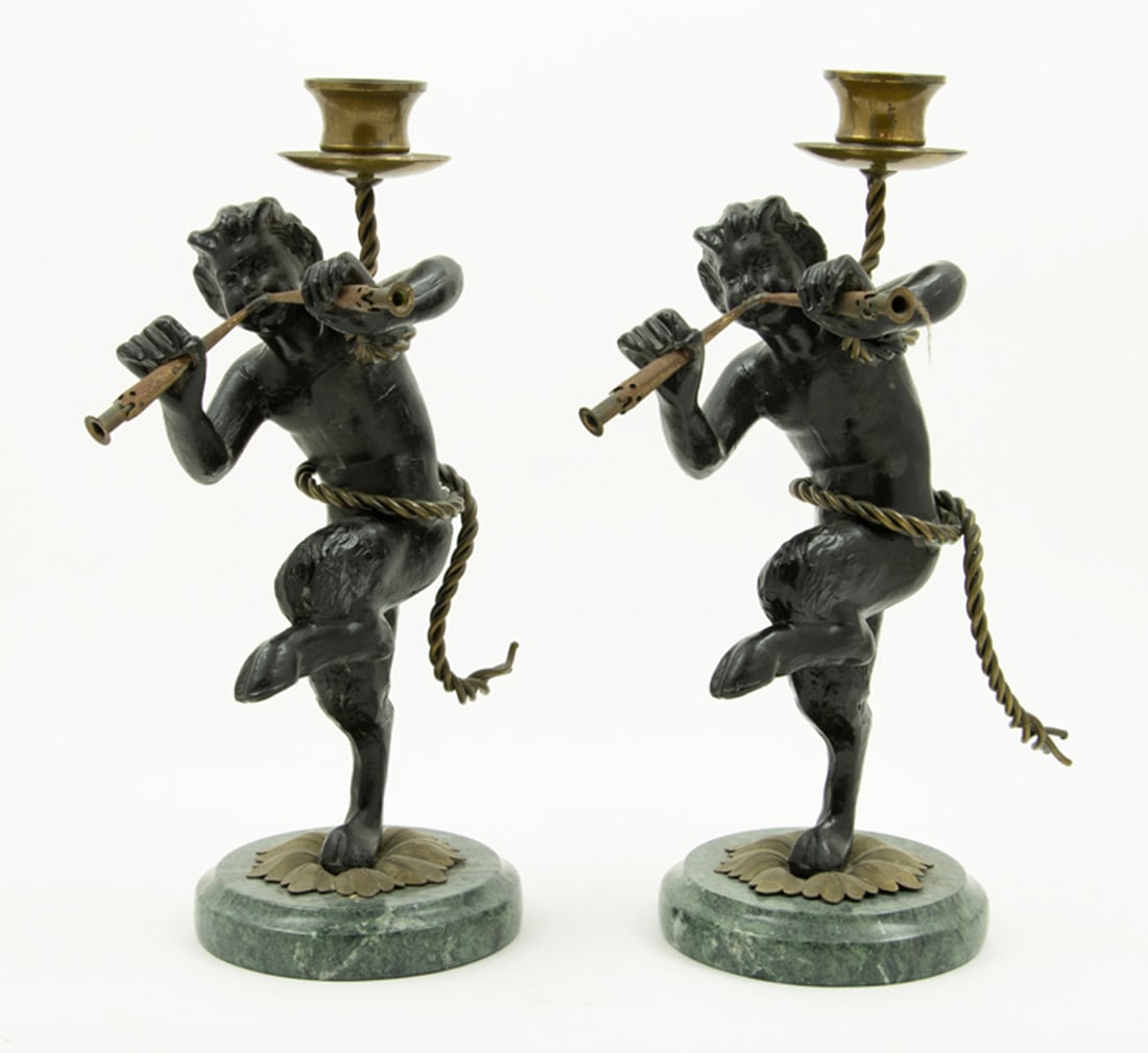 A pair of Louis XV style gilt bronze figural two-light candelabra of infant satyrs after Clodion: A pair of Louis XV style gilt bronze figural two-light candelabra of infant satyrs after Clodion, late 19th/early 20th century, incised 'Clodion', each raised on a white marble plinth, 10.5"h x 7.5"w