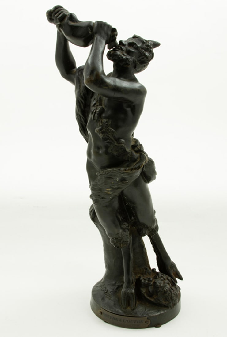 A Continental patinated bronze figure of a satyr after a model by Jean Claude Clodion: A Continental patinated bronze figure of a satyr after a model by Jean Claude Clodion, late 19th century, the figure depicted drinking from a raised wine bag, incised 'Clodion', title plaque