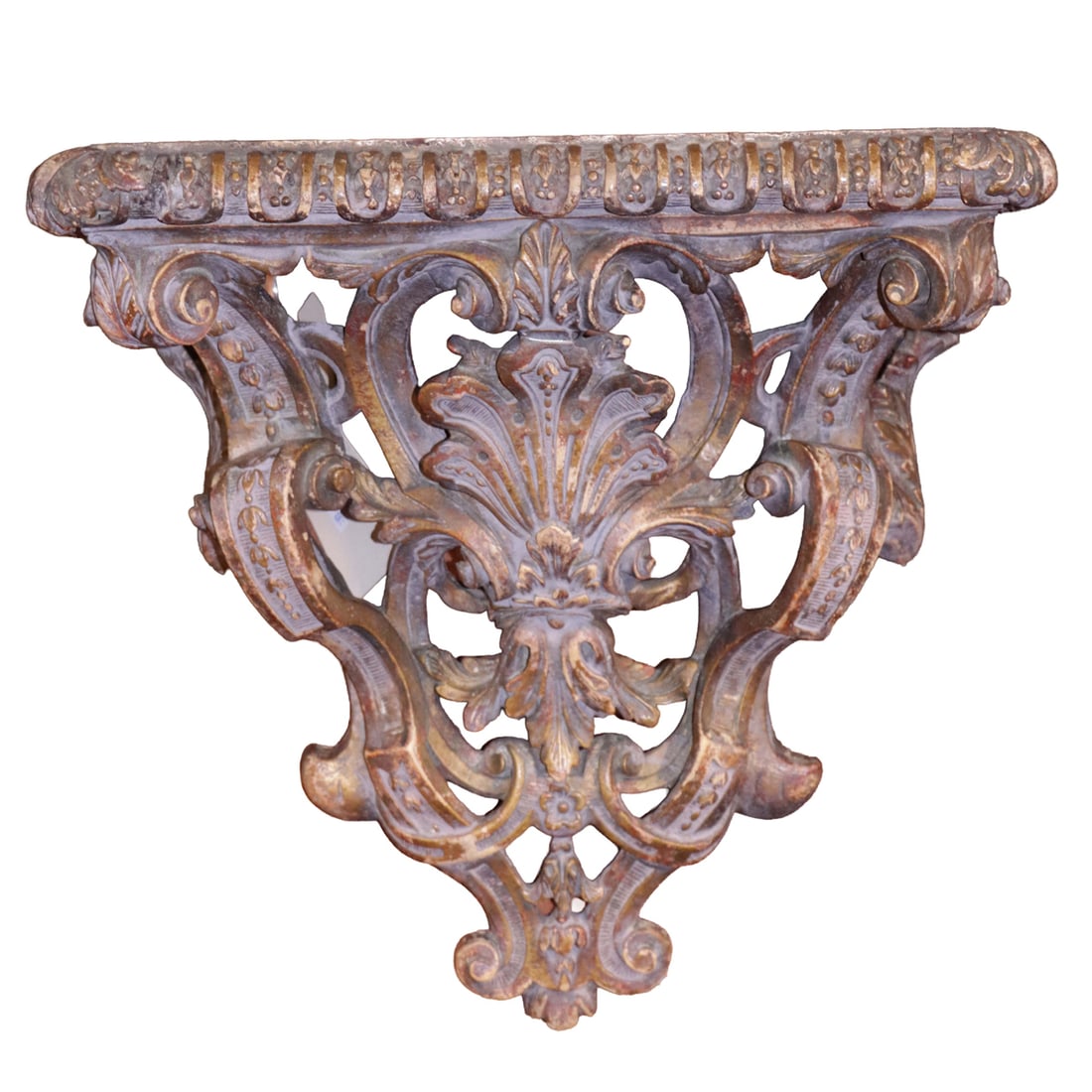 A Regence style burnished gilt composition wall bracket: A Regence style burnished gilt composition wall bracket, first half 19th century, the rectangular top supported on openwork scrolls centering a pierced shell and foliage designs, 14.25"h x 14.25"w x