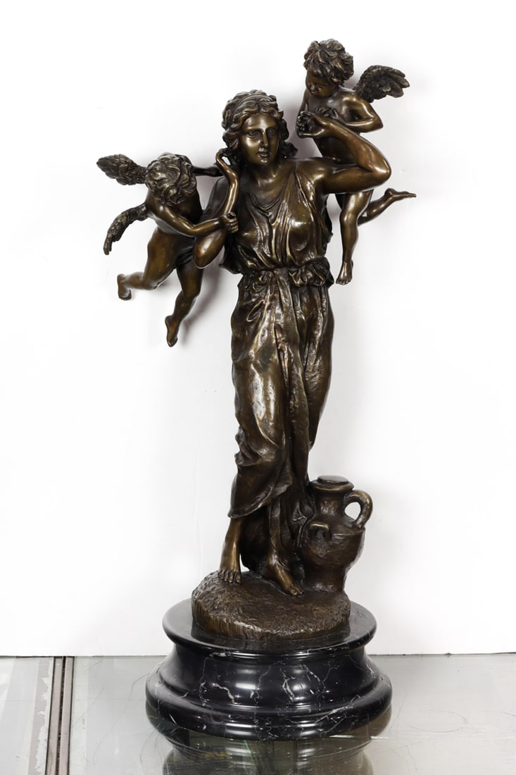 A Continental style patinated bronze figure of a woman with putti (1 of 1)