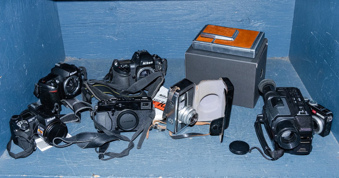 A collection of cameras including Nikon, Fuji and Polaroid (1 of 1)