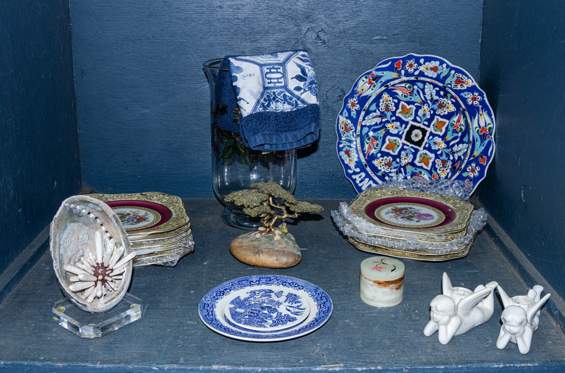 An assembled group of home decorative objects: An assembled group, comprising (1) glass vase with enameled decoration, 11.5"h; (1) majolica platter; (11) Bavarian square dishes with floral decoration; (1) sculpture of a bonsai; (1) hand towel; (1)