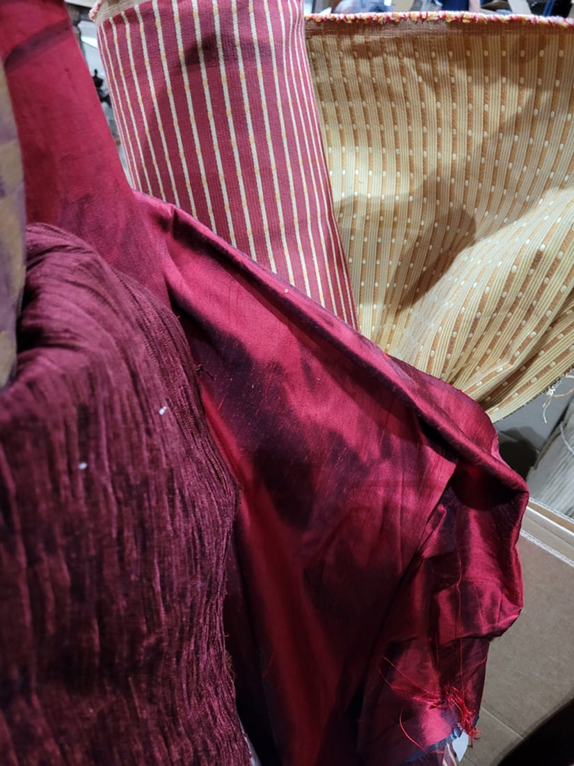 A group of seven red toned fabrics (1 of 7)