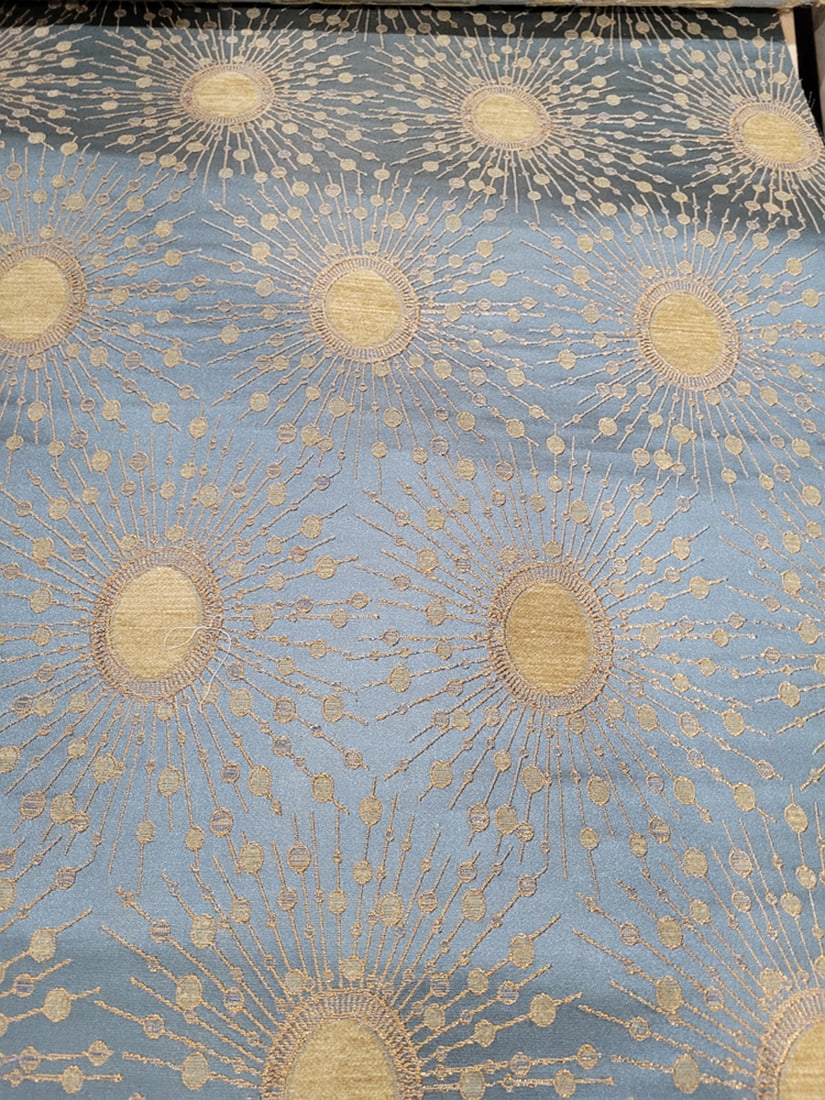 A group of five blue, green, and wheat toned fabrics: A group of five blue, green, and wheat toned fabrics, largest 60"w