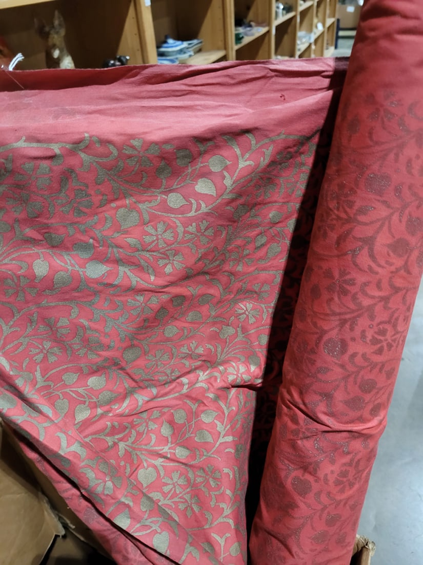 A group of two terracotta red fabrics: A group of two terracotta red fabrics, largest 57"w