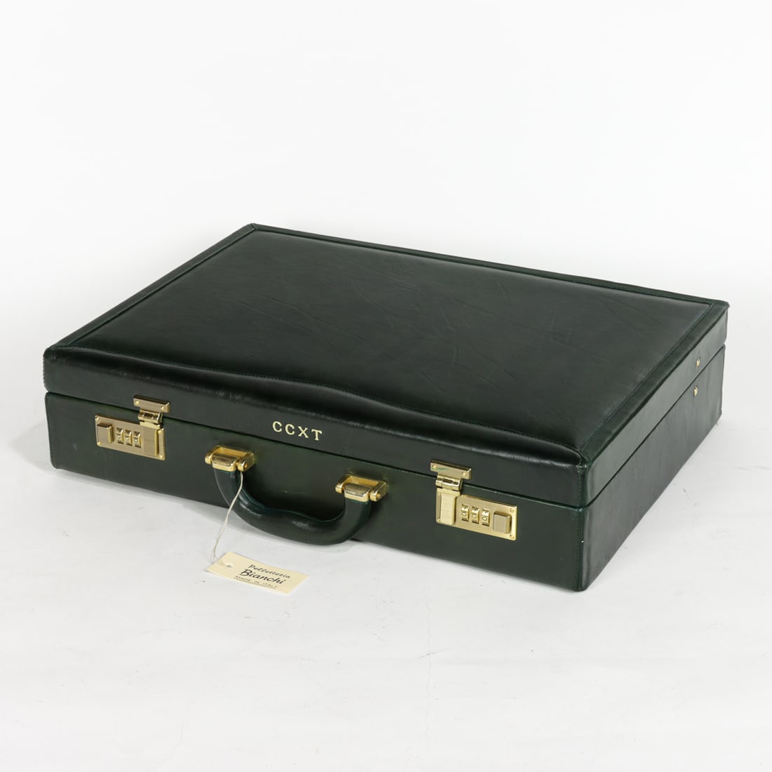 An Italian Pellettezia Bianchi green leather briefcase: An Italian Pellettezia Bianchi green leather briefcase with gilt monogram includes paper retailer's label, 4"h x 18"w x 13"d