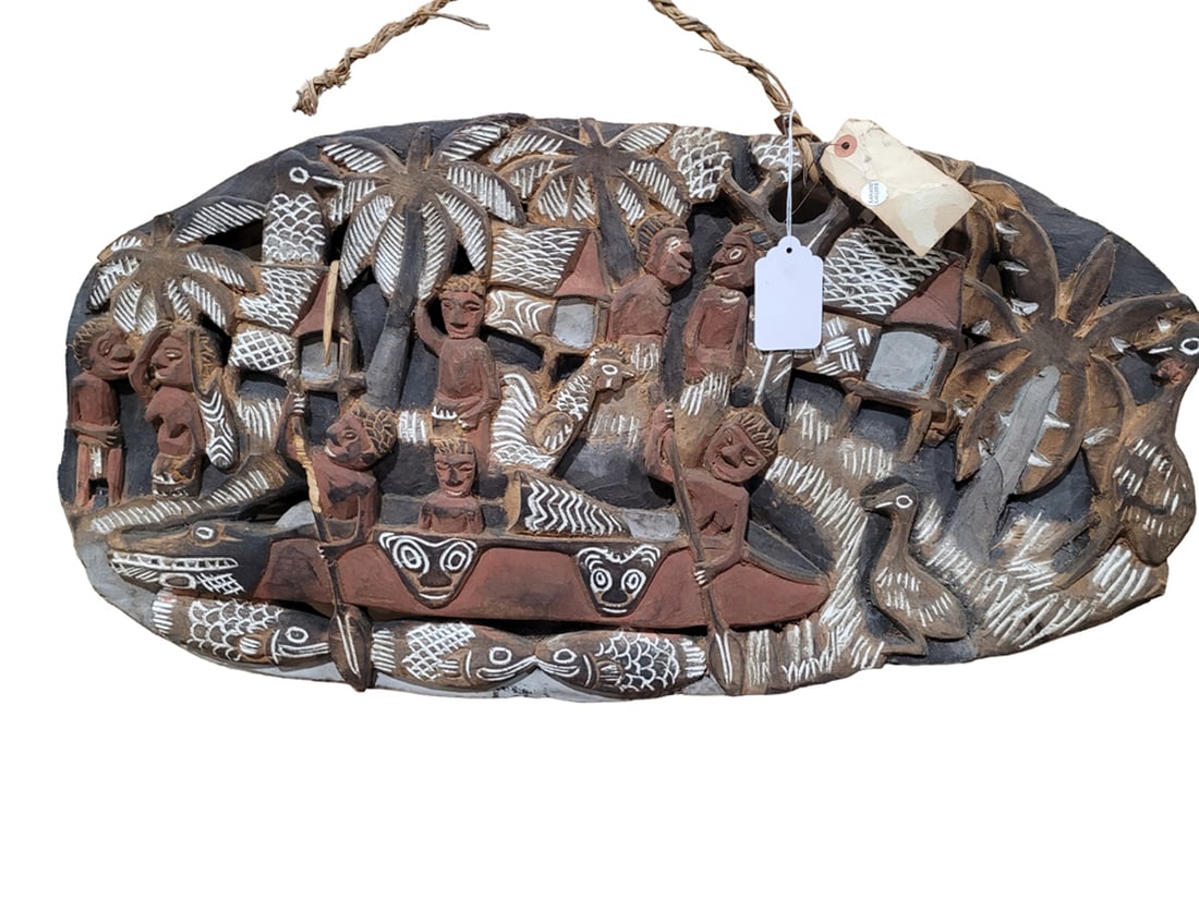 An Oceanic polychrome relief carved story board panel: An Oceanic polychrome relief carved story board panel, Papua New Guinea, 15.5"h x 30.5"w. Provenance: Xanadu Artifacts & Tribal Art, San Francisco and Palo Alto