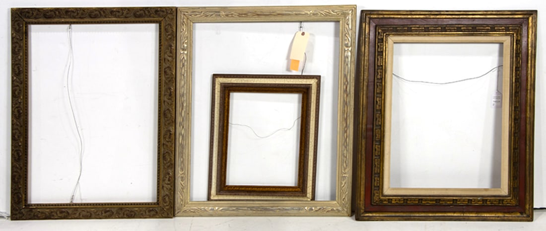 A group of four Arts and Crafts and other frames: A group of four Arts and Crafts and other frames, (1) overall 35"h x 26"w, rabbet 30"h x 21"w ;(1) overall 34.5"h x 28.5"w, rabbet 30"h x 24"w; (1) overall 34"h x 28"w, rabbet 24"h x 18"w; (1)