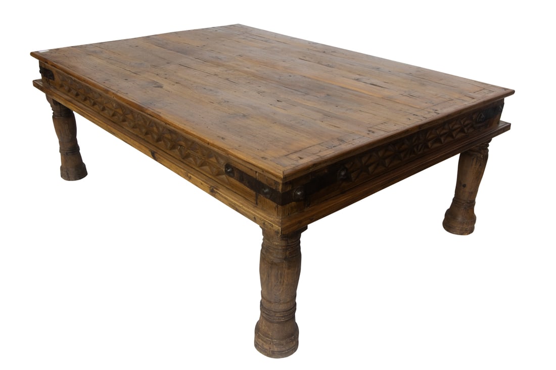 A large rustic carved coffee table - 2