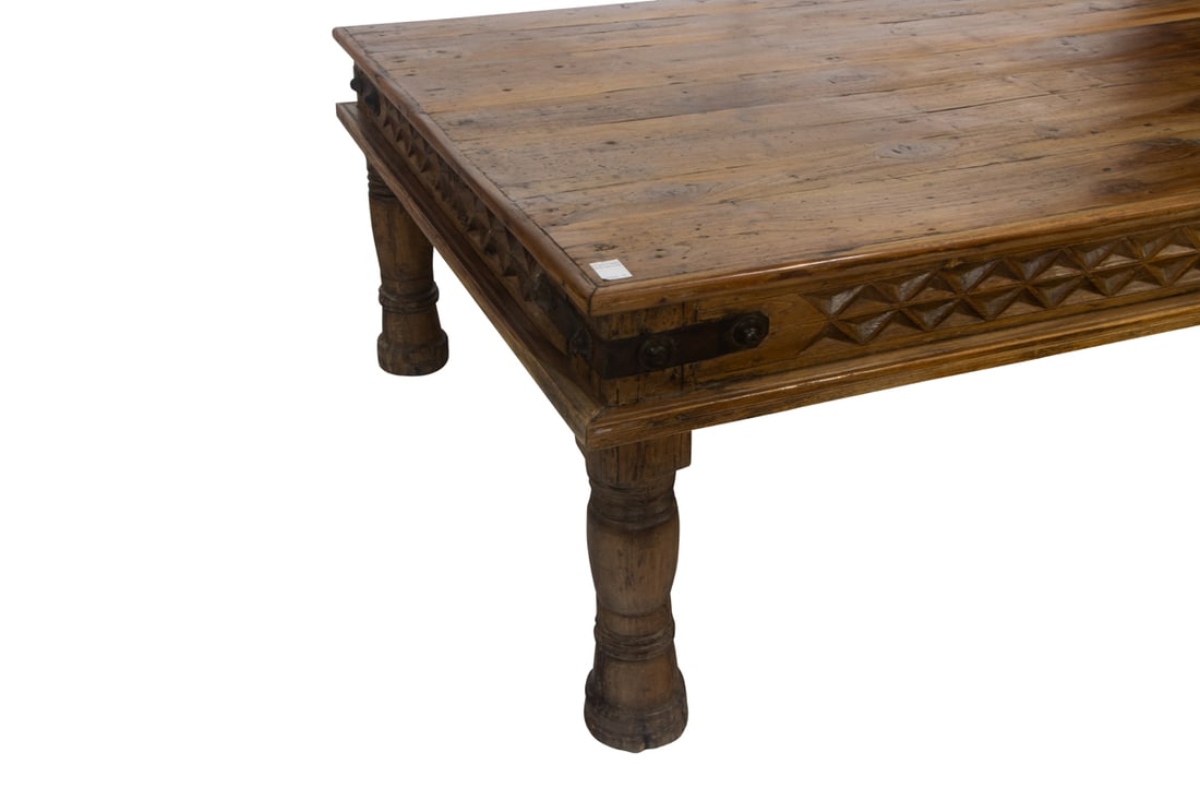 A large rustic carved coffee table - 6