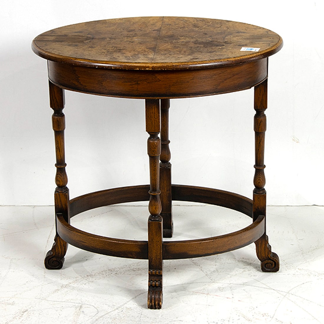 A Victorian burlwood oval side table: A Victorian burlwood oval side table, 25.5"h x 25"w x 19"d. Provenance: From the Estate of Margaret G. Huntington; by descent from her mother-in-law, Marian Prentice Huntington (daughter of American