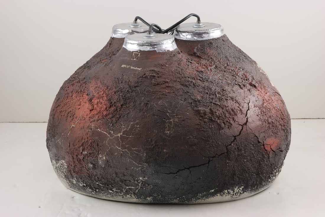 A Serhii Makhno for Makhno Studio volcanic pottery chandelier: A Serhii Makhno for Makhno Studio volcanic pottery chandelier, the organic hemispherical form with a highly textured "lava" surface with white glazed interior, impressed factory mark, approx 14"h x