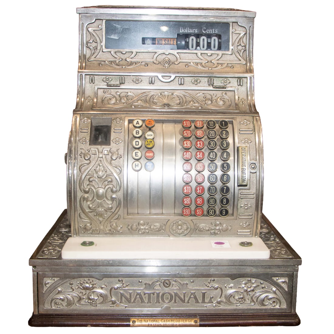A National nickel plate cash register: A National nickel plate cash register, model 1064, serial no. 864778, the ornate case cast with Art Nouveau floral and vine motifs, the single drawer base with marble coins slab, 22.5"h x 18"w x 15"d