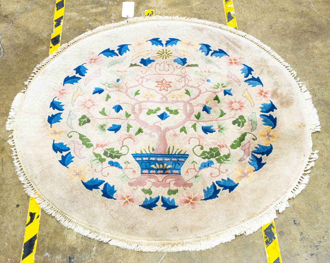 A pair of Chinese Art Deco circular carpets: A pair of Chinese Art Deco circular carpets, 3'10" dia