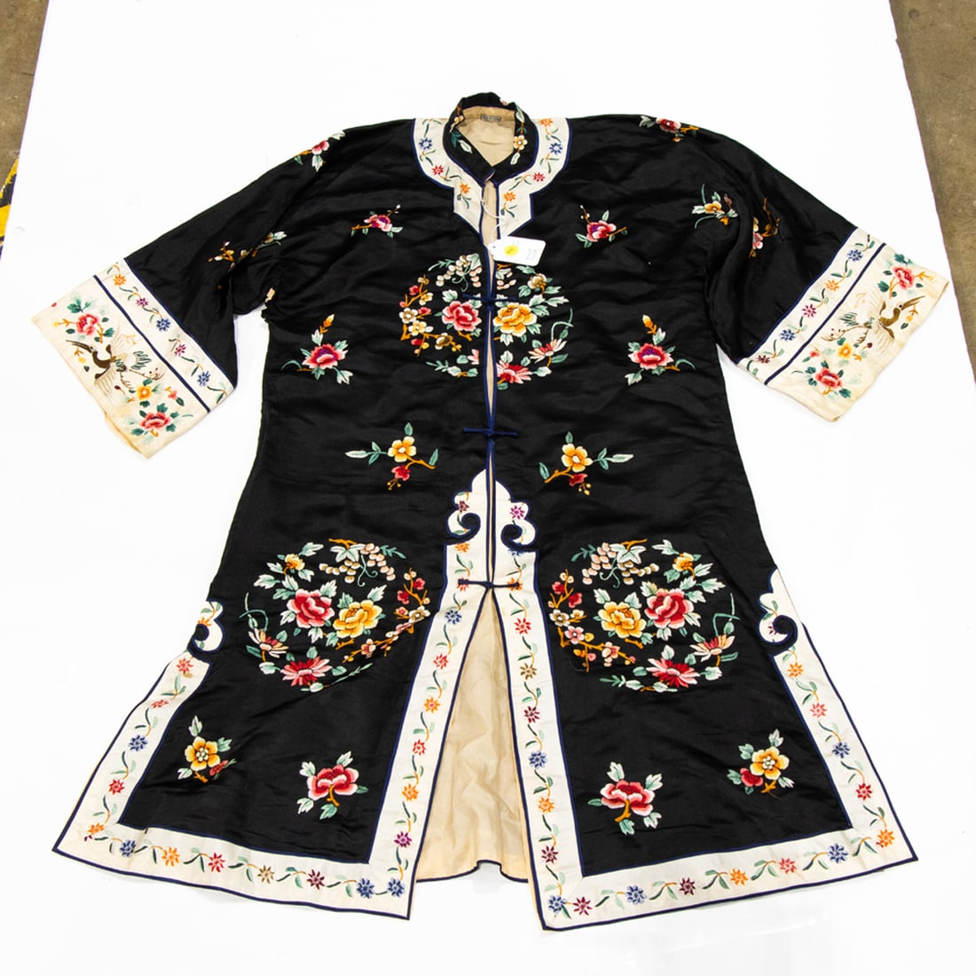 A Chinese embroidered black ground robe (1 of 1)