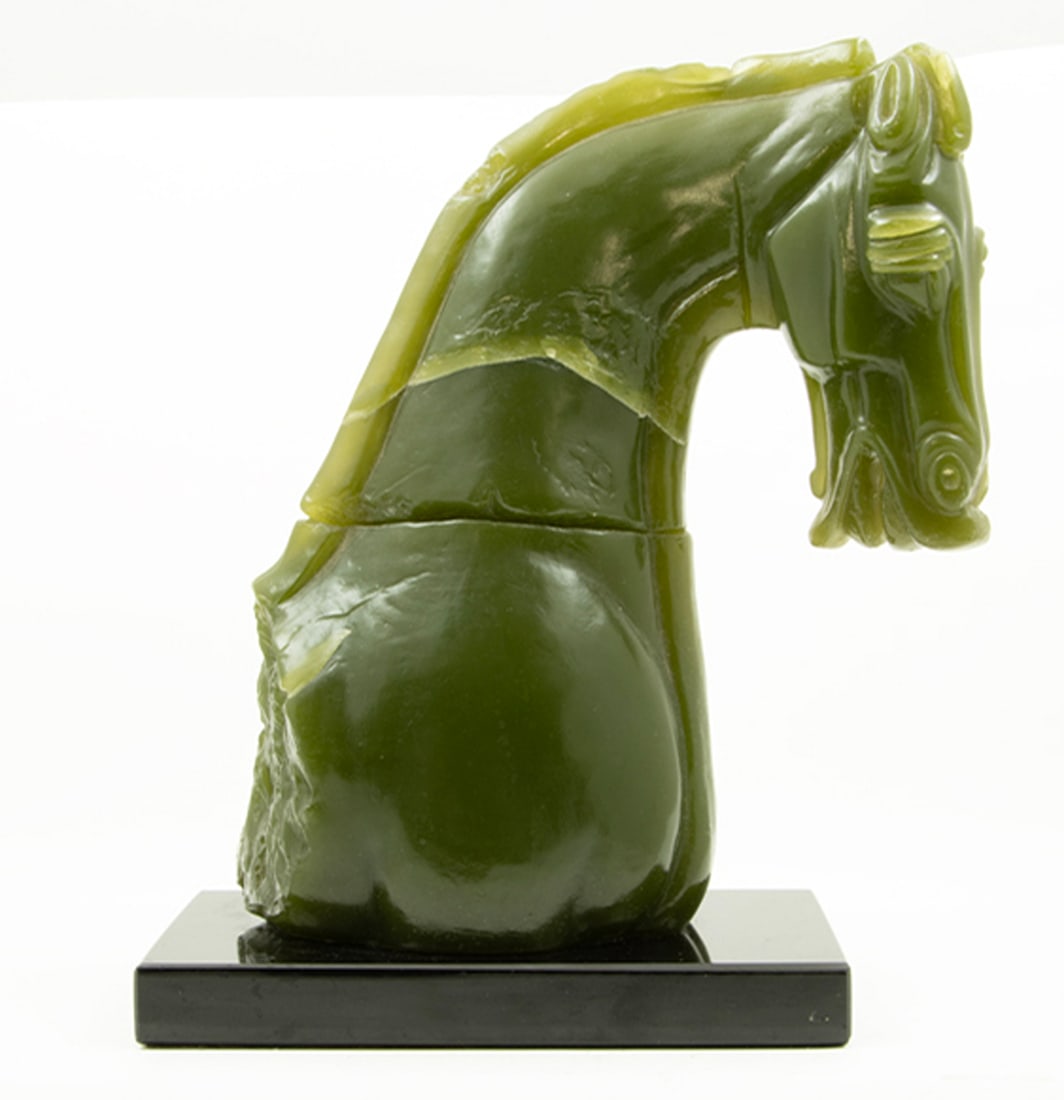 A Chinese green hardstone horse-head carving (1 of 4)