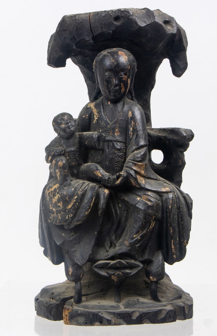 A Chinese black lacquered figure of Guanyin and Child group (1 of 1)