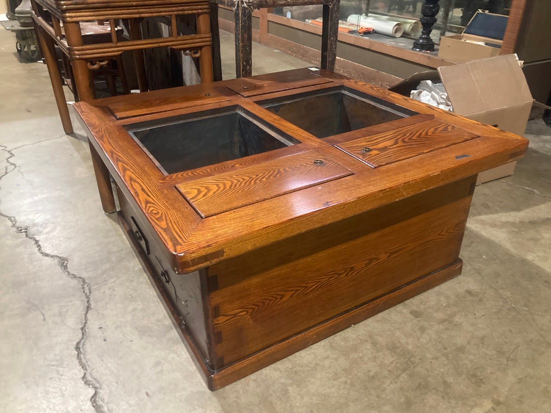 A Japanese double-hibachi: A Japanese double-hibachi. Early 20th century, 20.25"h x 43.25"w