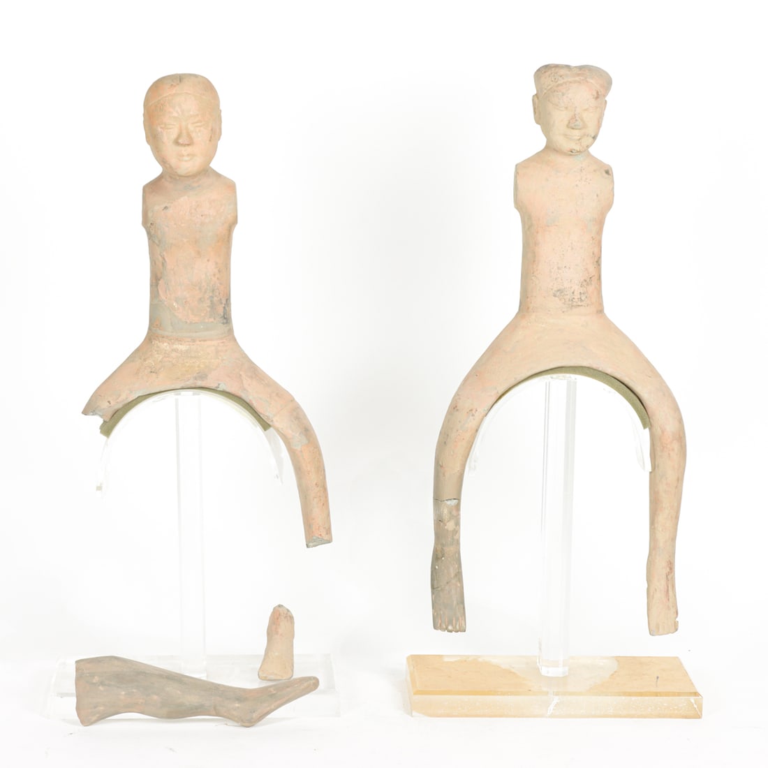 (lot of 2) Chinese pottery figures of a rider: (lot of 2) Chinese pottery figures of a rider. Han dynasty, 21.75" high.