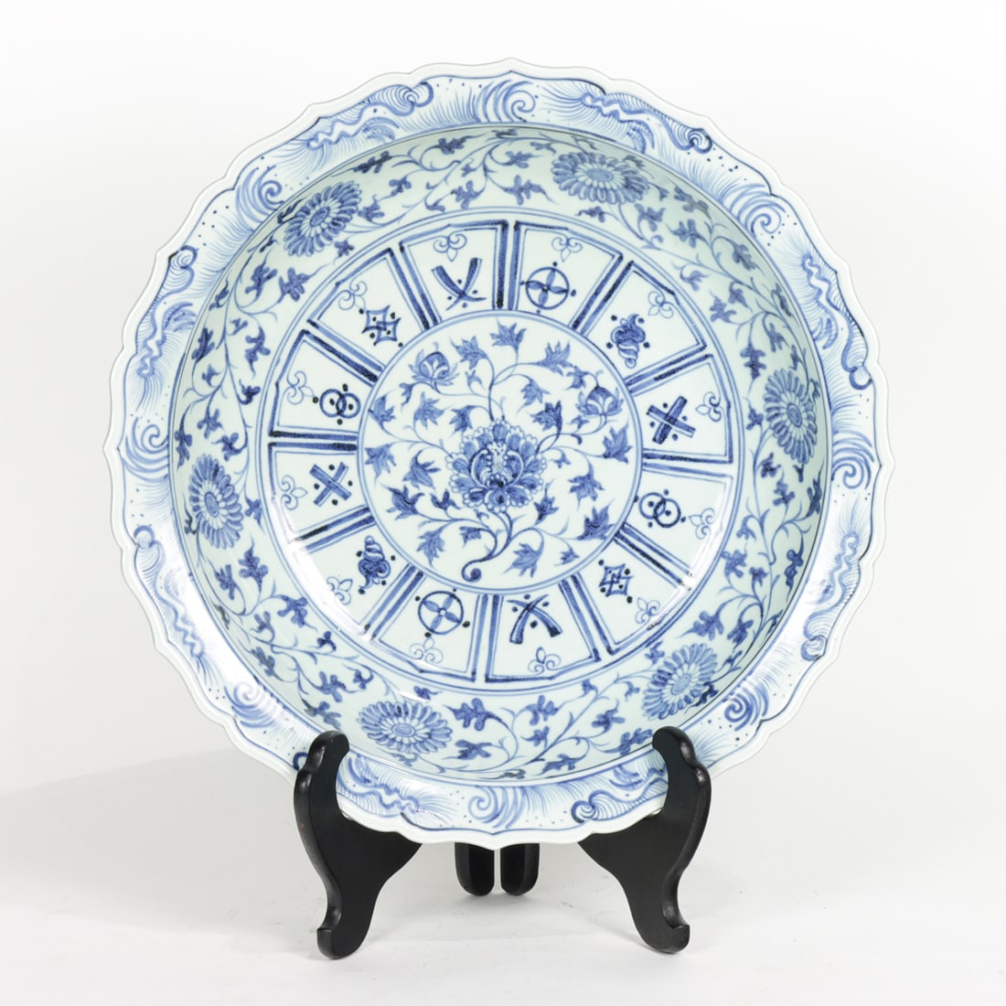 A Chinese Ming style blue and white charger: A Chinese Ming style blue and white charger. 20th century, 17.25" wide.