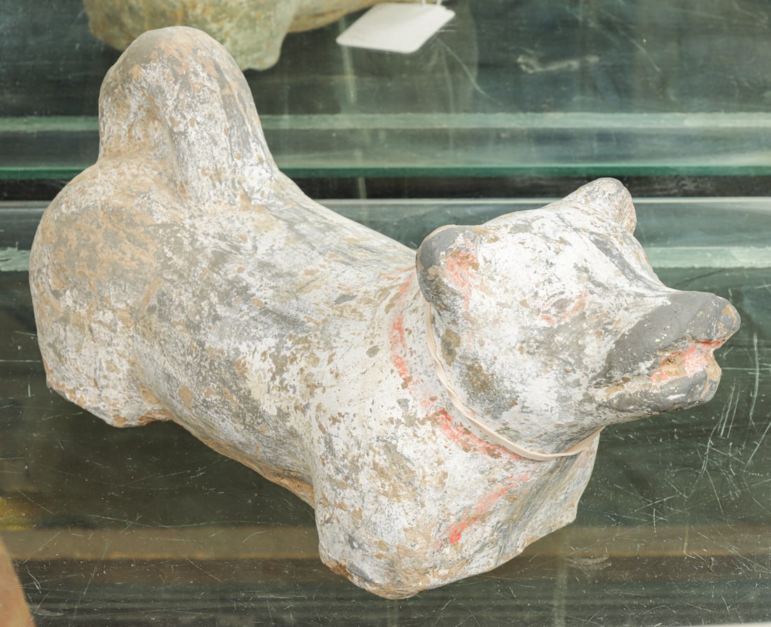 A Chinese painted pottery of a dog: A Chinese painted pottery of a dog. Han dynasty, 12" long.