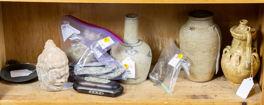 A shelf of Chinese ceramics and decorative articles (1 of 1)