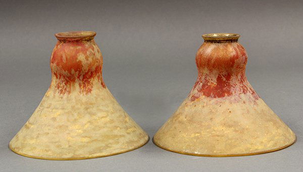 Pair of Daum Nancy lamp shades: Pair of Daum Nancy lamp shades, each having a mottled crimson to gold body, the top with a 1.75" fitter, the flaring body centered with a Daum Nancy etched mark, overall 5.5"h x 7"w