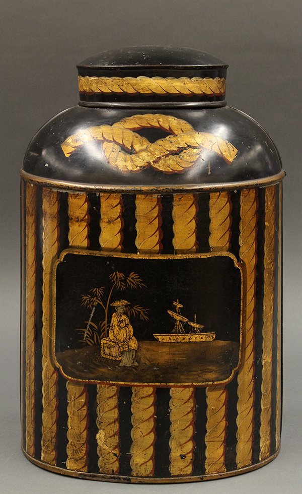 Chinoiserie tole decorated tin tea canister: Chinoiserie tole decorated tin tea canister, second half 19th century, the black body with gilt accents centered by a scenic reserve depicting a sailing vessel at sea, a countryman seated on a crate u