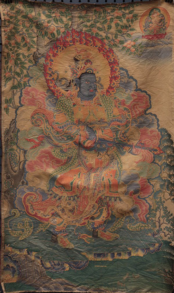 Two Woven Sino-Tibetan Thangka: (lot of 2) Sino-Tibetan woven thangka, the first of a four armed dakini holding a bow and arrow dancing above a figure; the second of Virudhaka (Zengzhang tianwang), the blue faced guardian in militar