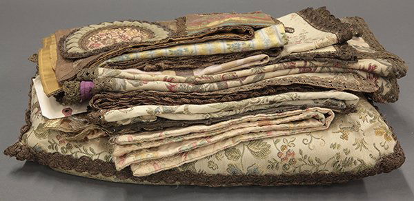 Jacquard textiles in the french taste: (lot of 14) Jacquard textiles in the French taste including table runners and doilies, as well as a pillow