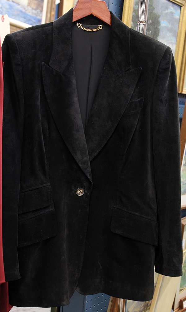 Gucci women's black blazer: Gucci, Made In Italy, 100% Pelle Leather women's black blazer designed with peak lapels, jetted flap pockets, and double vent back, fully lined, size 42