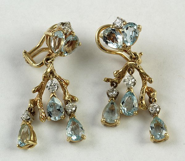 Pair of aquamarine, diamond, 14K yellow gold drop: Pair of aquamarine, diamond, 14K yellow gold drop earrings set with 10 pear shaped aquamarines totaling approximately 5.50 ct, accented by 8 old European cut diamonds totaling 0.88 ct.; 11.0 grams.