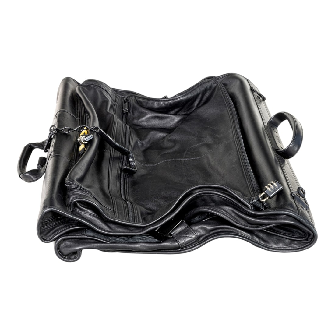 A Tumi black leather garment bag: A Tumi black leather garment bag, 20"h x 22"w x 6"d (folded); 37"h (open). Provenance: The Estate of Senator Dianne Feinstein (1933?2023) and Richard C. Blum (1935?2022)