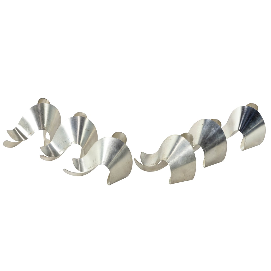 Napkin Rings, Chunghi Choo: (lot of 6) Chunghi Choo (Korean/American, 1938-1986), Untitled (Napkin Rings), 1987, metal napkin rings, each signed near the edge, each overall: 4.5"h x 3.5"w x 2.5"d