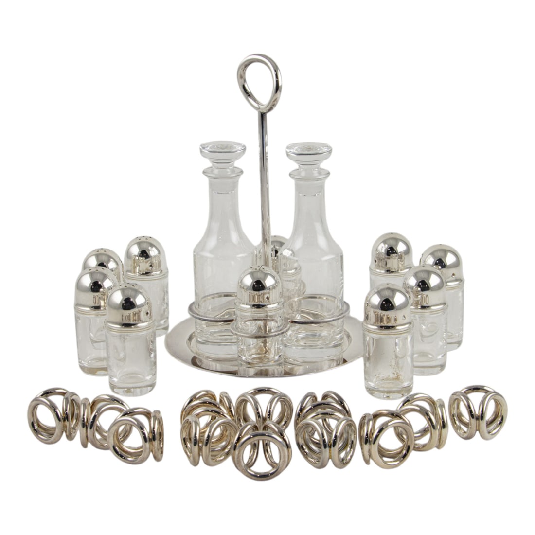 A group of Andree Putnam for Christofle silver plate table articles from the Vertigo Collection: A group of Andree Putnam for Christofle silver plate table articles from the Vertigo Collection, each with Christofle factory mark, comprising (12) place card holders, 1.5"h, (8) salt and pepper