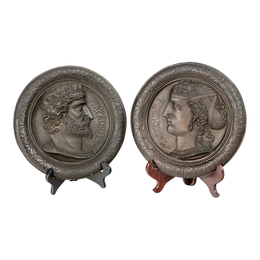 A pair of Grand Tour patinated metal portrait wall plaques of Tarquin and Lucretia: A pair of Grand Tour patinated metal portrait wall plaques of Tarquin and Lucretia, 19th century, each Roman historical figure depicted in profile, 11.5"dia