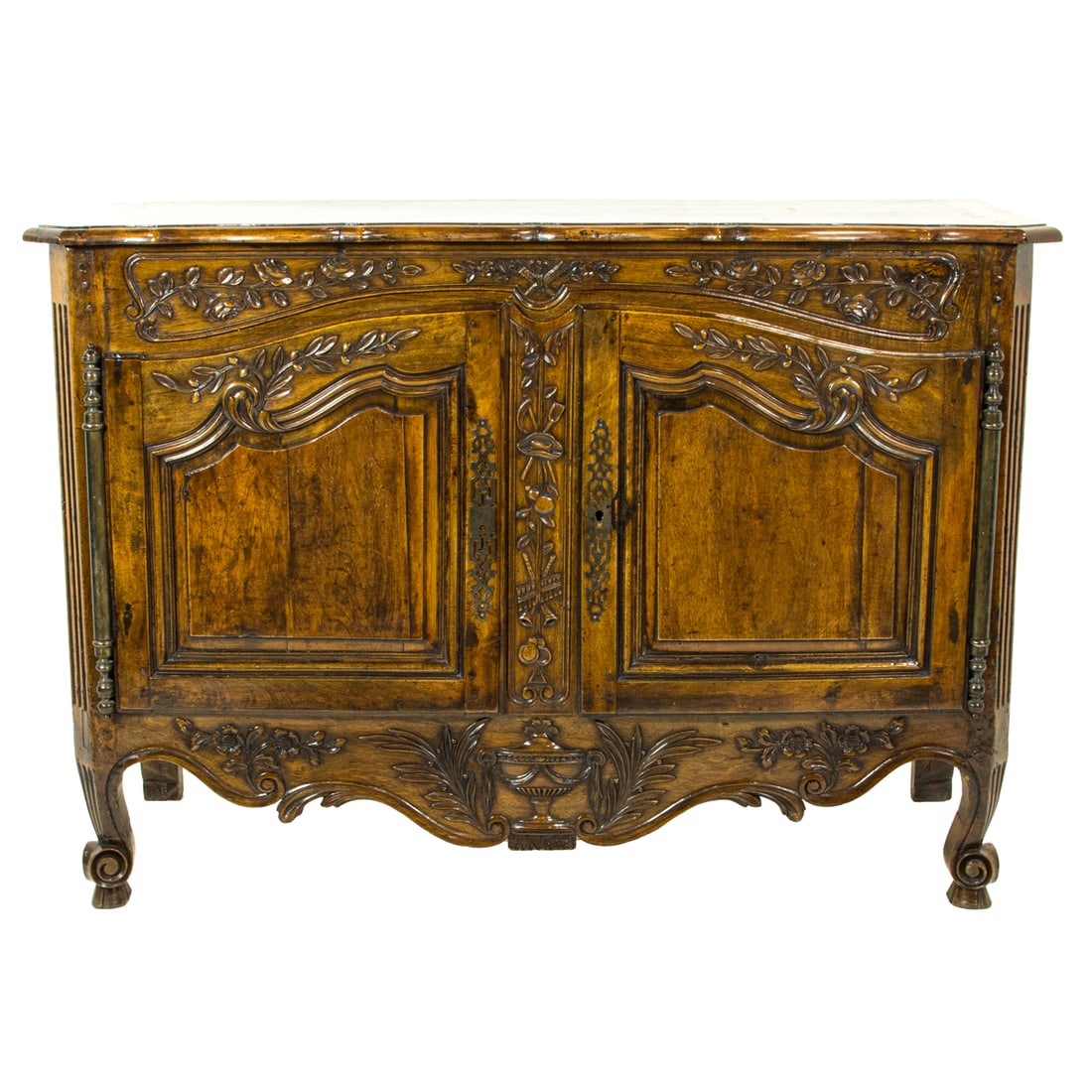A French Louis XV provincial commode 19th century: A French Louis XV provincial commode 19th century, with a carved two door case with scallop apron, and rising on carved upswept feet, 36"h x 52.5"w x 22"d