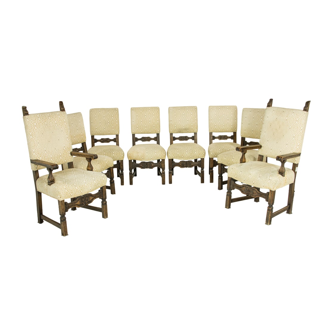 A set of eight Spanish Revival chairs circa 1920: A set of eight Spanish Revival chairs circa 1920, the six sidechairs each with a carved splat surmounted by the square back and rising on carved baluster legs: 39"h x 18"w x 18.5"d (overall); 16"d (se