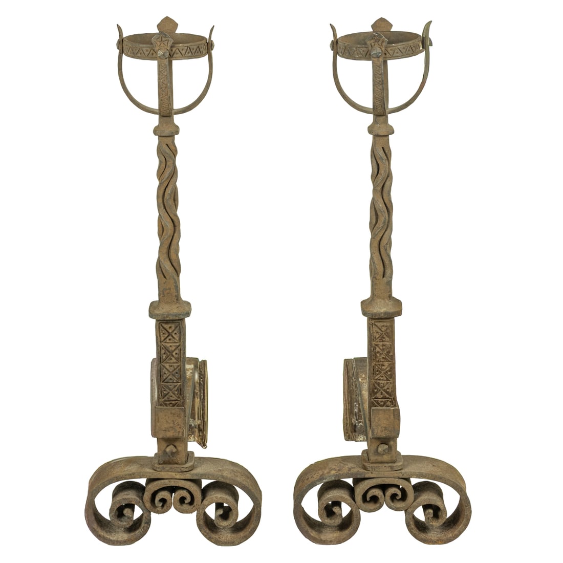 A pair of large hand wrought andirons circa 1900: A pair of large hand wrought andirons circa 1900, the large form with candle holder above the twist and impressed support terminating on inswept base, 38"h x 22"w x 12.5"d