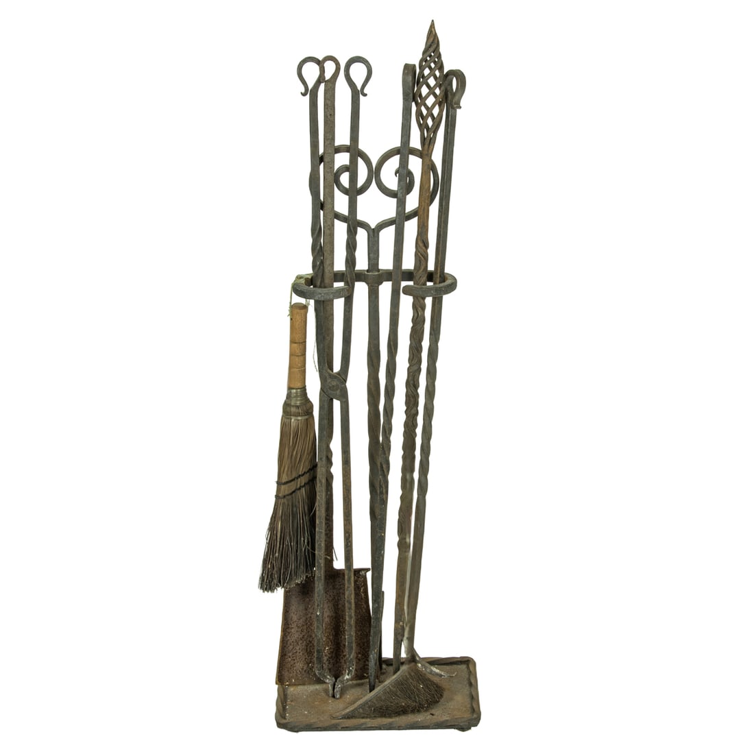A set of hand wrought iron fireplace tools: A set of hand wrought iron fireplace tools, early 20th century, consisting of two pokers, broom, tongs, and shovel, greatest 39"h; 12"l x 8"w (base)