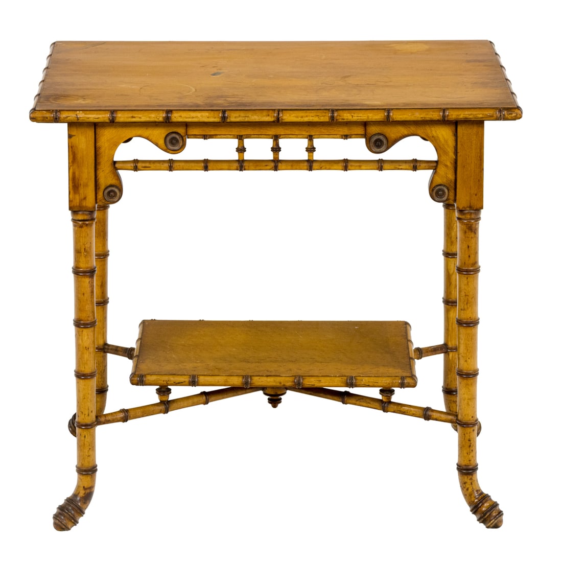 An American Victorian faux bamboo side table attributed to R. J Horner: An American Victorian faux bamboo side table attributed to R. J Horner, New York, the rectangular top with a faux bamboo apron joining the flour outswept legs terminating on outswept feet, 28"h x 30"l