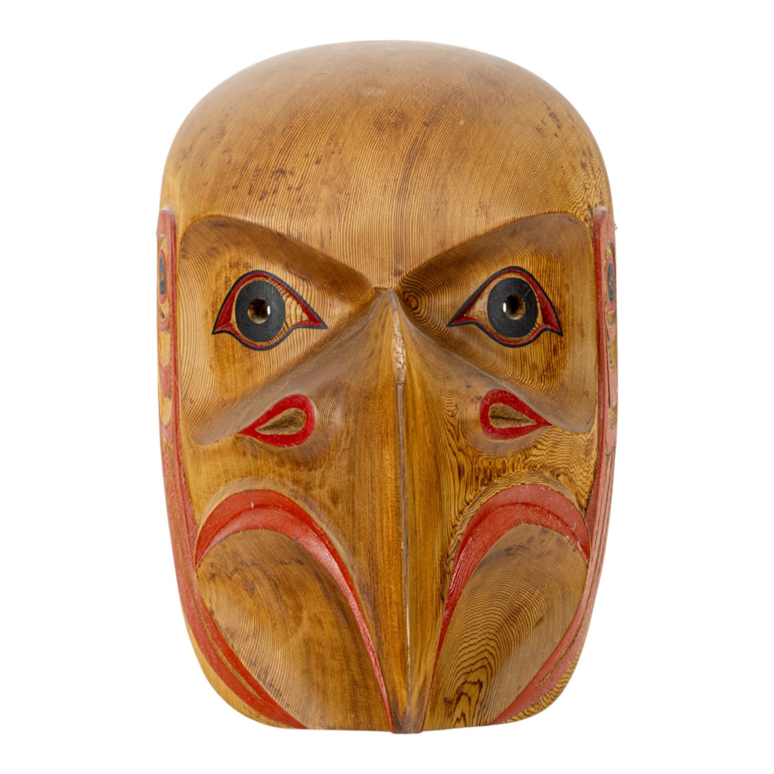 A Pacific Northwest Eagle Mask, Curtis Miller: A Pacific Northwest Eagle Mask, 1999, Curtis Miller, Coast Salish, Seachelt, British Columbia, Canada, carved and painted with wings in red and black, signed and dated in ink, 13"h x 8"w x 9"d